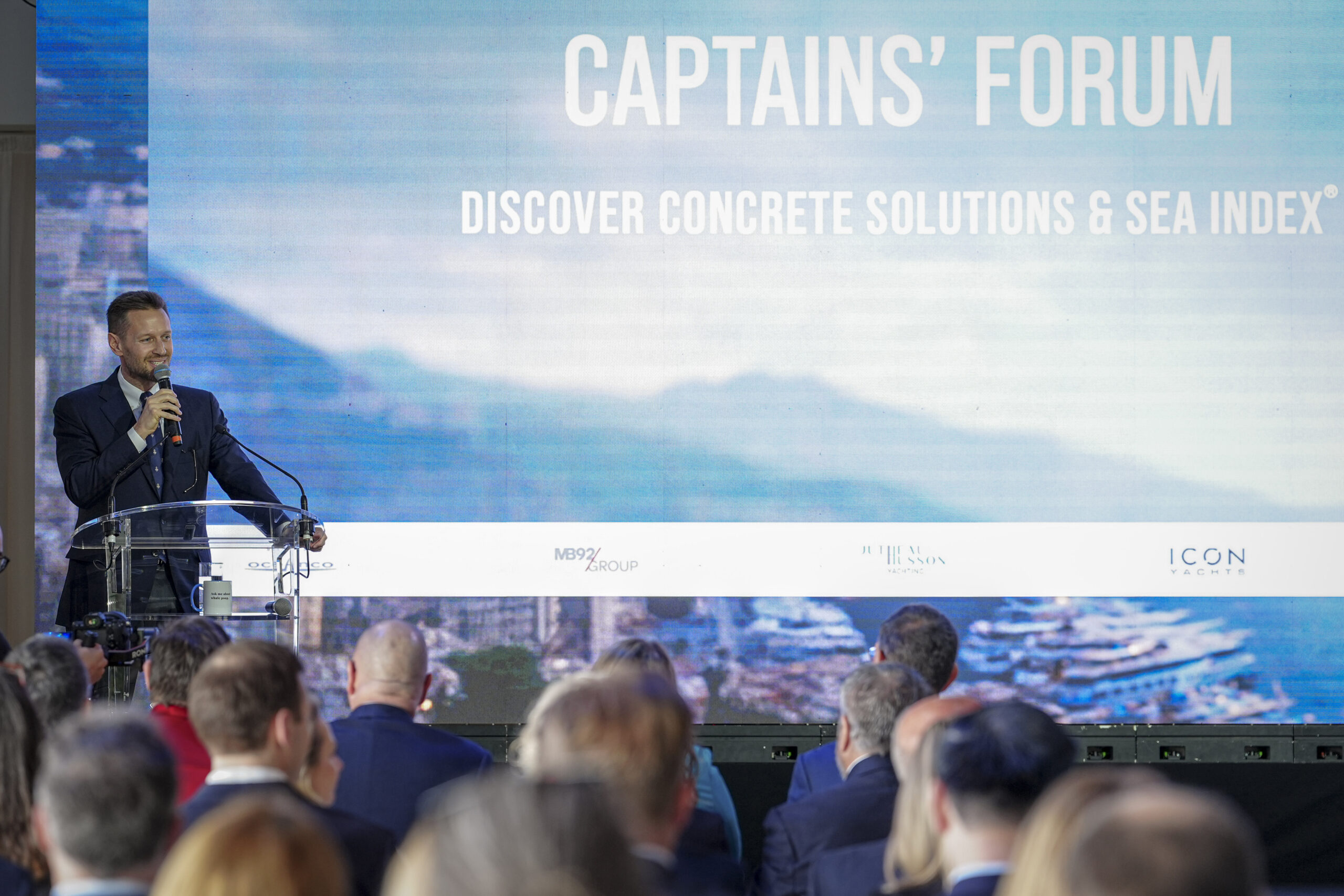 Micca Ferrero, owner of ICON Yachts, who recently signed a partnership with the Yacht Club de Monaco through its Captains' Club is seen on stage for t