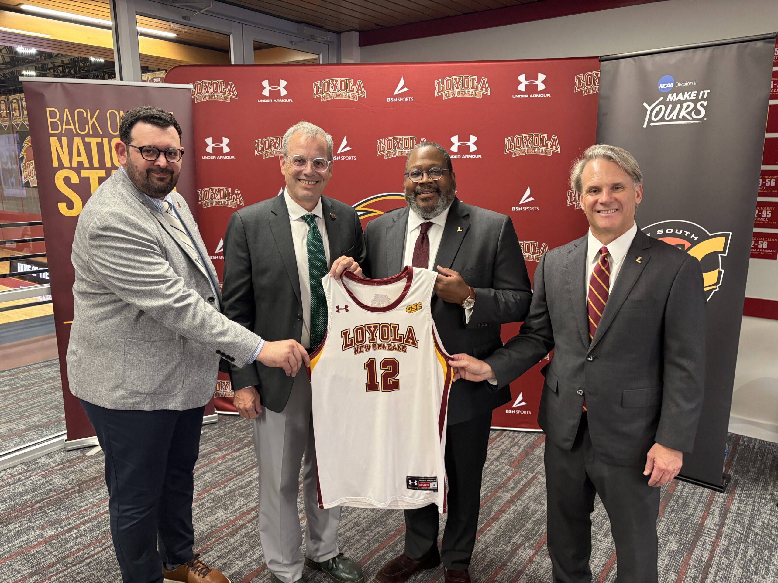 Loyola University New Orleans Announces Historic Return To NCAA Competition Through Gulf South Conference Membership Loyola University President Dr. Xavier A. Cole with Loyola's A.V.P Intercollegiate Athletics and Reps from GSC