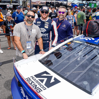 Patriot Mobile Donates Premium NASCAR Advertising Space to Warrior Rising to Empower Veteran Entrepreneurs Warrior Rising Logo on Patriot Mobile Sponsored Race Car