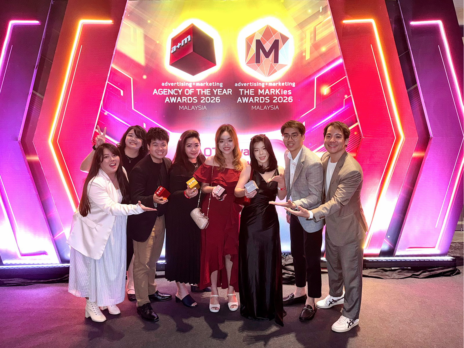 LOCUS-T (Malaysia) được nhận 4 giải thưởng tại Lễ trao giải Công ty Quảng cáo + Tiếp thị của năm 2026 LOCUS-T team members celebrating the 4 honours at the Advertising + Marketing (A+M) Agency of the Year Awards 2026, reflecting the collective achievement and dedication behind the recognition.