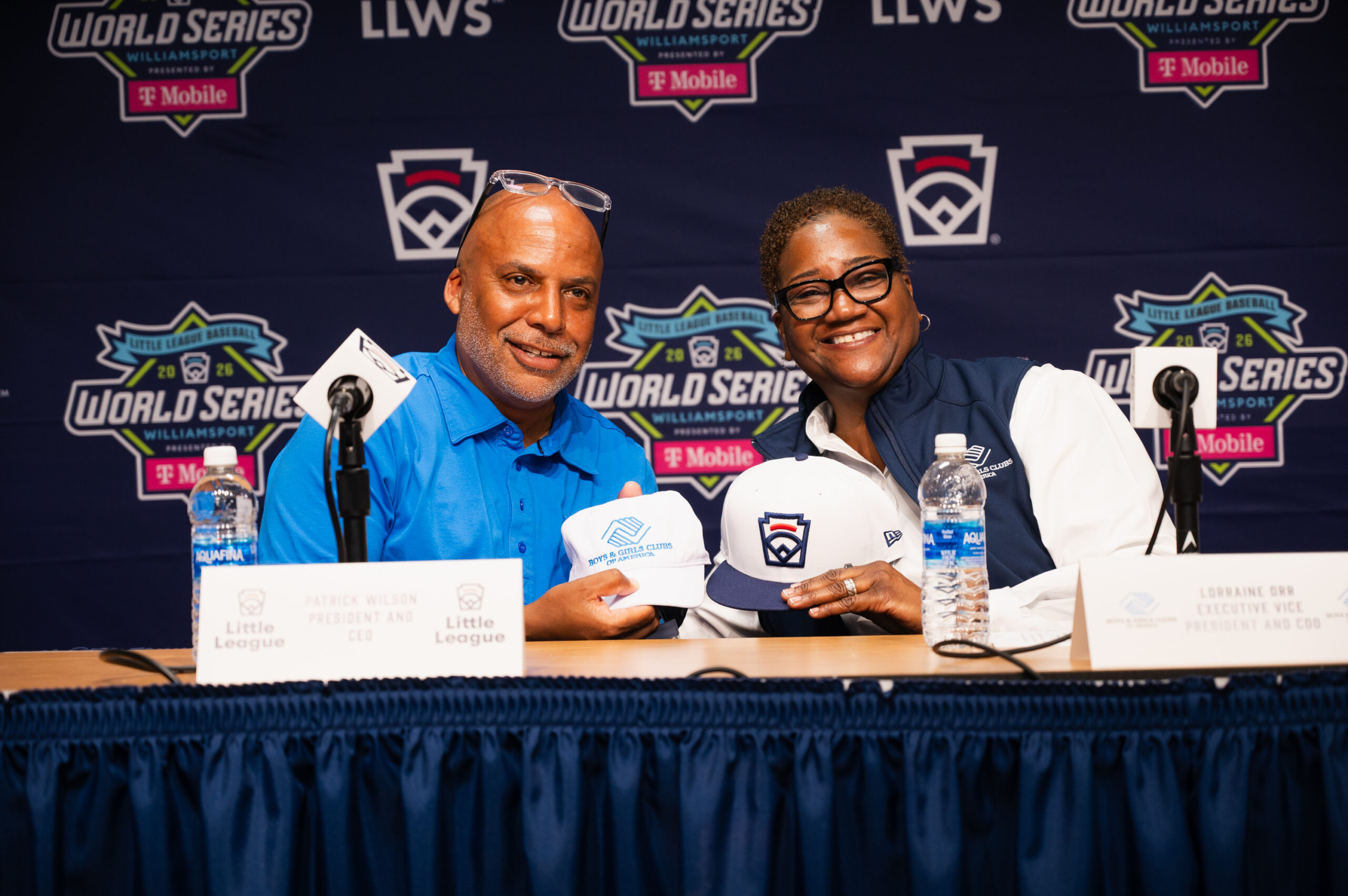 Little League® and Boys & Girls Clubs of America Announce Partnership to Expand Opportunities for Children and Communities Patrick Wilson, Little League President and CEO, and Lorraine Orr, Boys & Girls Clubs of America Executive Vice President and Chief Operating Officer, exchange caps to signify the new partnership at a Press Conference on Sunday, August 23.